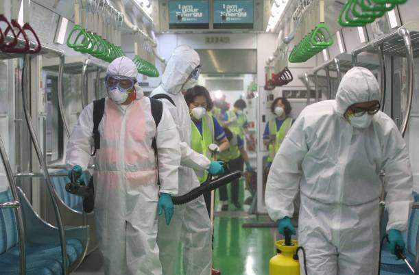 Workers disinfect a subway train in Seoul as MERS outbreak continues (Source: Seoul Community Page)